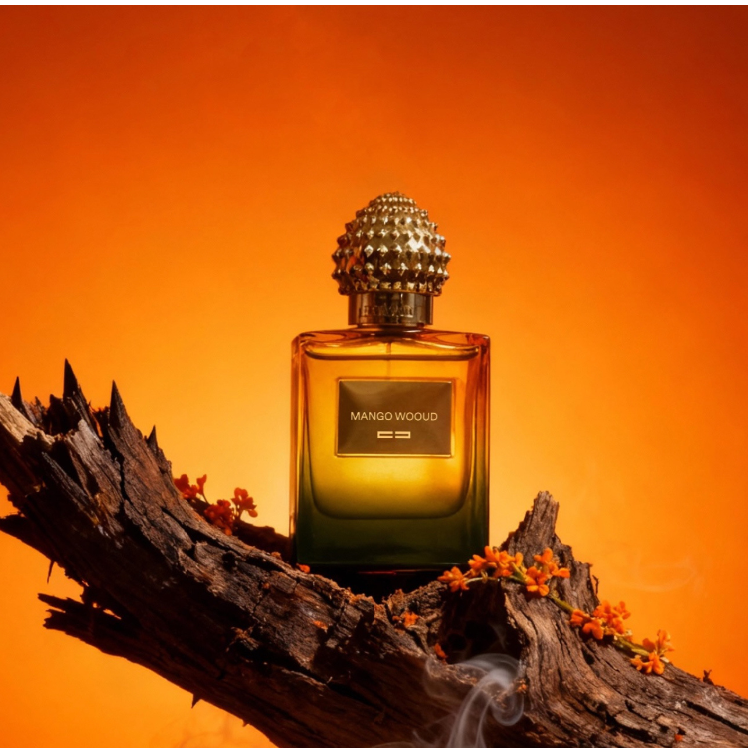 Parfums d’Elmar Mango Wooud Eau de Parfum Flakon inszeniert auf Oud-Holz
